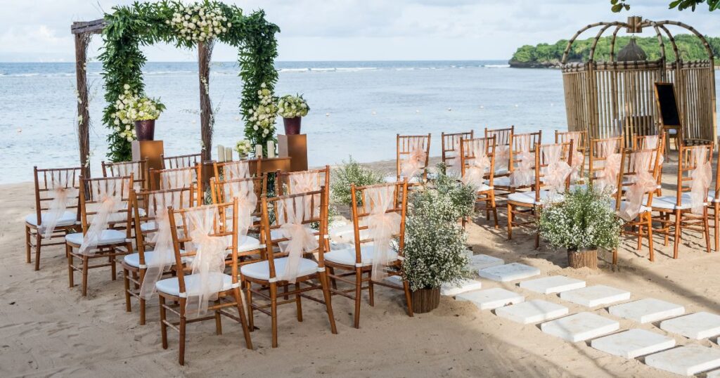 wedding guests gathered for a beach ceremony at a Caribbean all-inclusive destination wedding