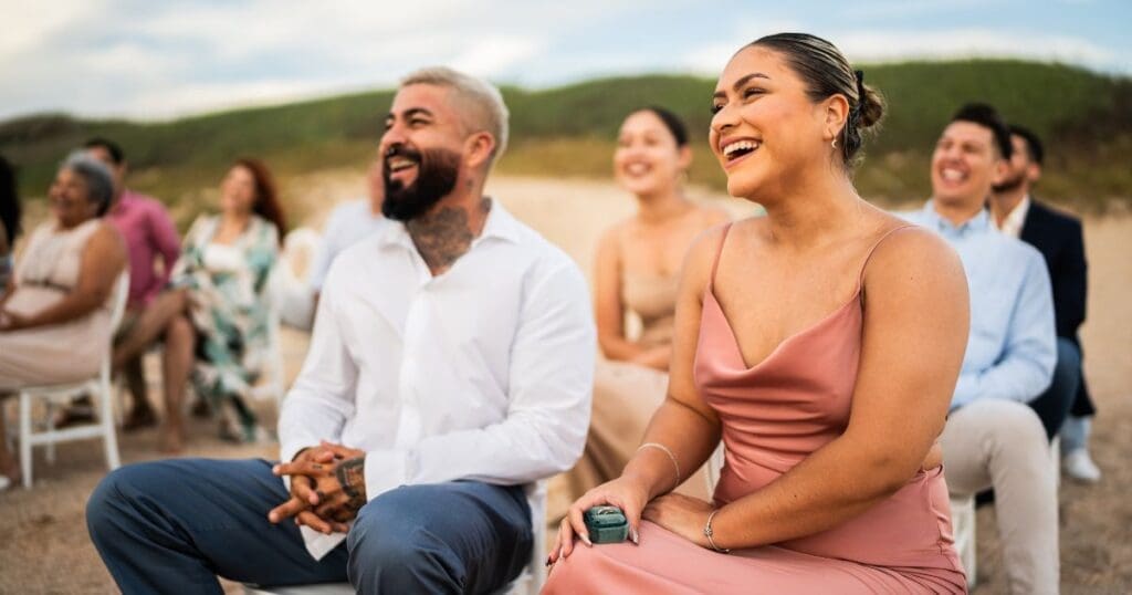 wedding guests gathered for a beach ceremony at a Caribbean all-inclusive destination wedding